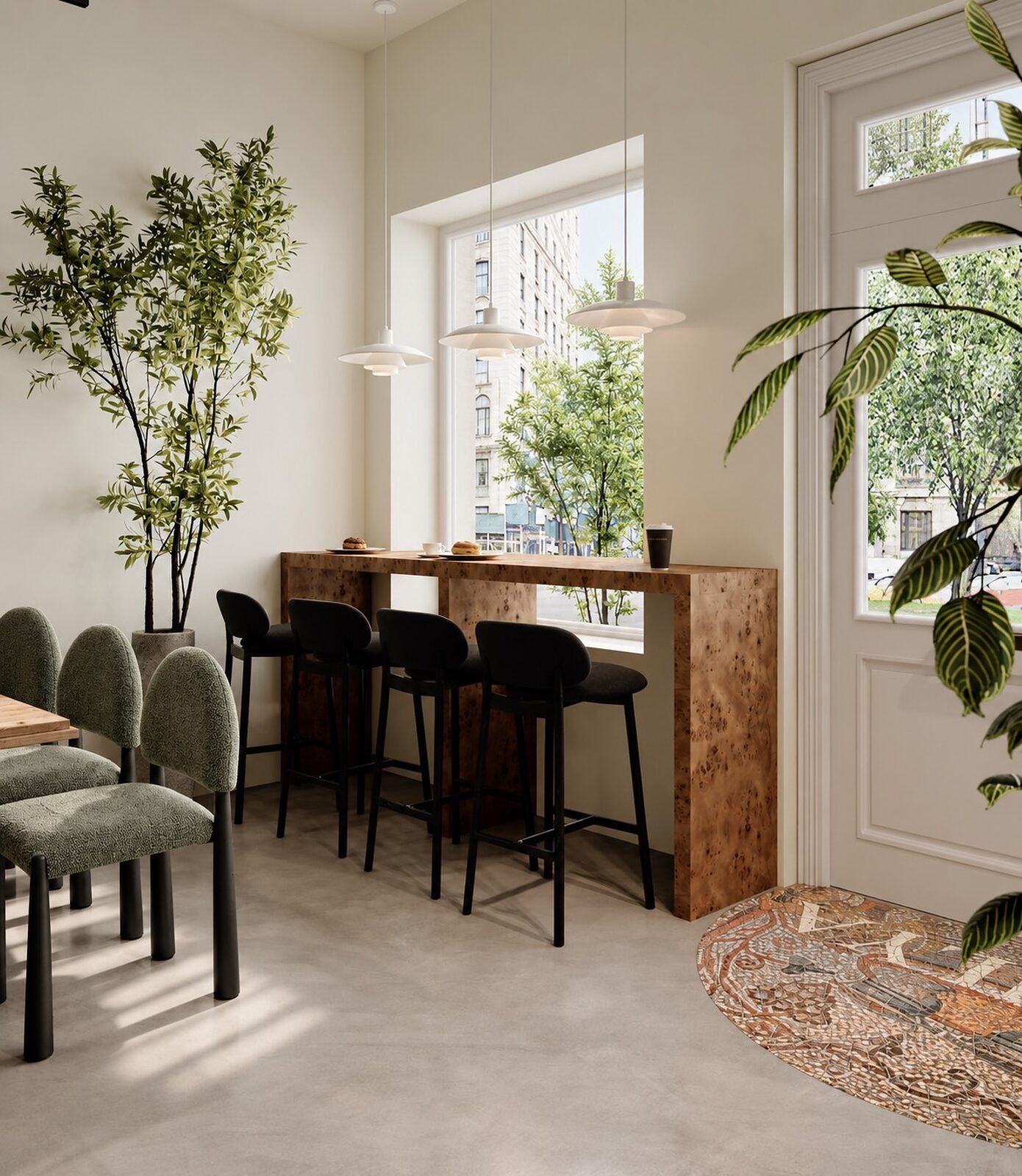 Window seating in morning light, with tall plants and a mosaic rug at the entry