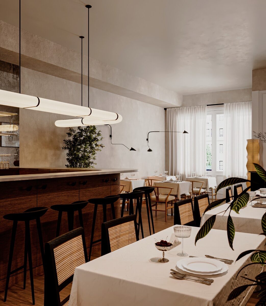 The bar in pale plaster with rattan-backed stools, looking through to the dining tables