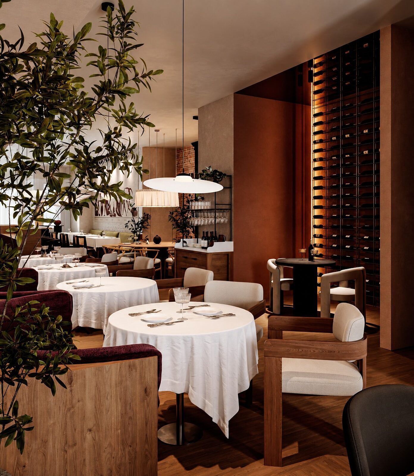 Sesilya’s dining room — white-clothed tables among olive trees, with the backlit wine display glowing beyond
