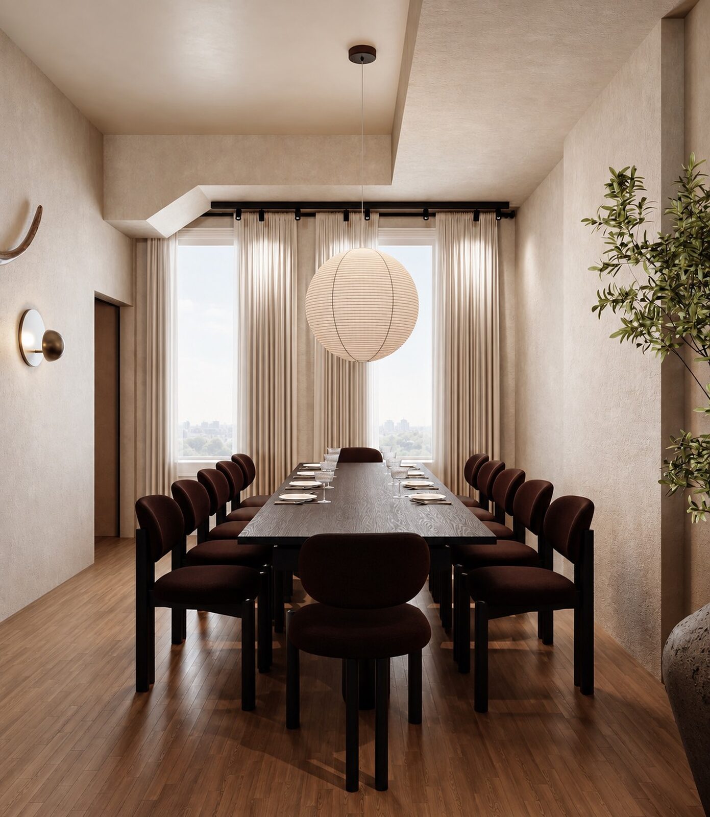 The private dining room — a long dark table set for the supra, lit by a paper lantern